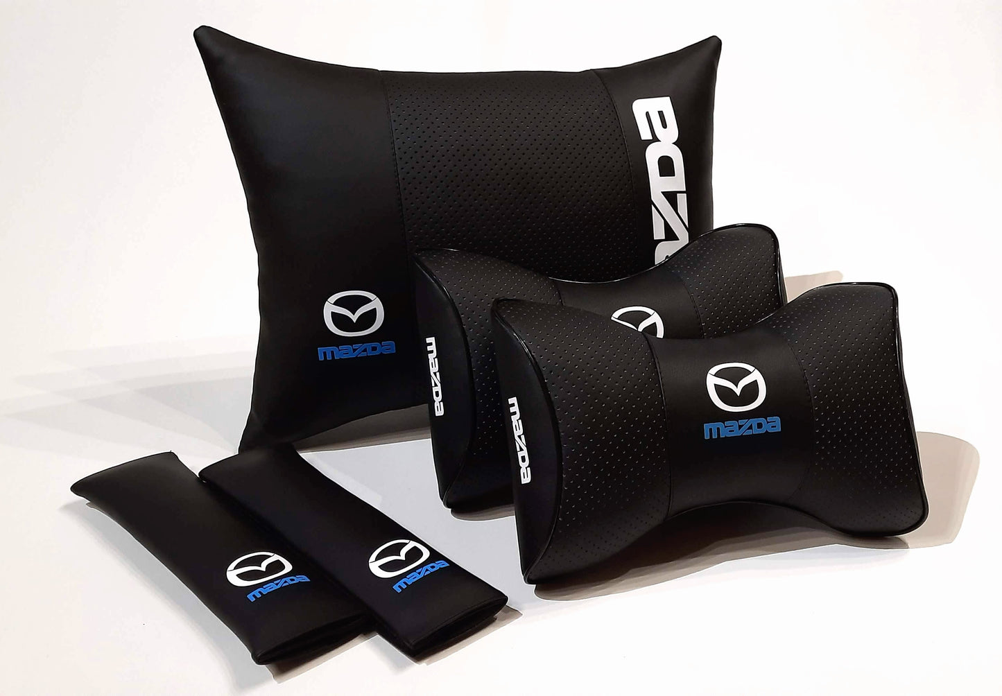 Ein Satz Innenzubehör-Mazda-Autokissen